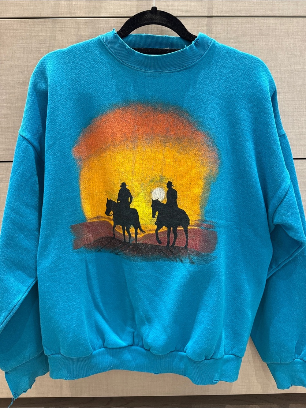 Vintage Horse back rider sunset